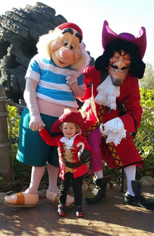 A mini Captain Hook with the character in Disneyland Paris
