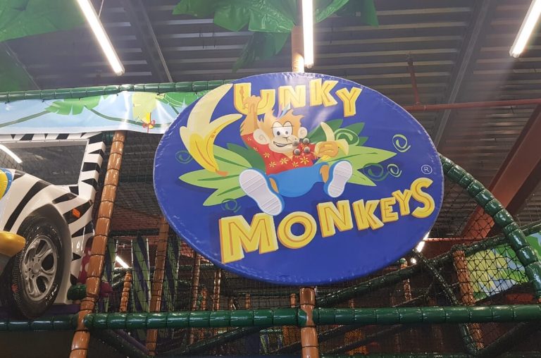 The funky Monkey's sign on the side of the soft play area in this Dublin kids venue